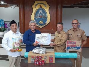 SKK Migas - PetroChina Jabung Serahkan Bantuan Penanganan Banjir di Tanjab Timur