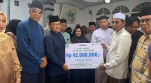 Wali Kota Maulana Salurkan Santunan Jaminan Kematian untuk Tiga Ketua RT di Kota Jambi